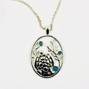 Silver Tone Sea Turtle Pendant Necklace W/ Blue Stone Accents on Long Chain